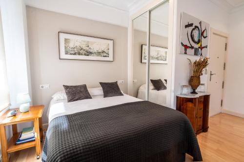 Una cama o camas en una habitación de Estudio reformado en Puerto Chico Santander