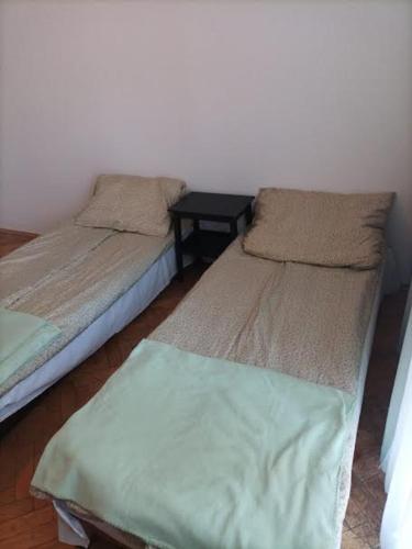 Postel nebo postele na pokoji v ubytování Jak w PRL