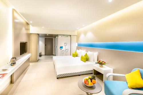 Postel nebo postele na pokoji v ubytování ZIBE Coimbatore by GRT Hotels