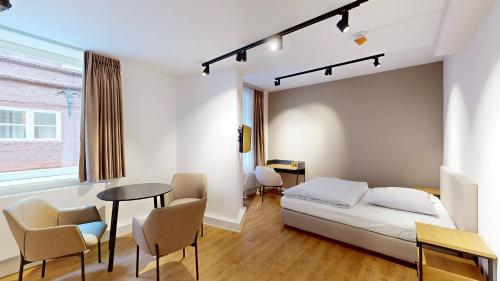 Posezení v ubytování Apartment 03 No 8A Boardinghouse Lüneburg