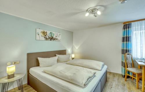 Ένα ή περισσότερα κρεβάτια σε δωμάτιο στο Amazing Apartment In Bischofsheim