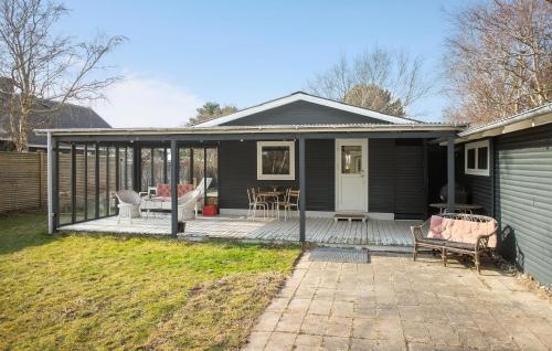 a screened in porch of a house at 3 Bedroom Pet Friendly Home In Korsør in Korsør