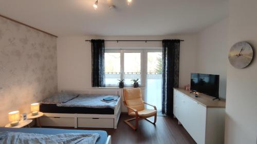 Postel nebo postele na pokoji v ubytování Ferienwohnung im Moselland