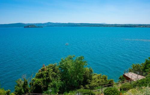 a large body of water with a boat in it at 1 Bedroom Beautiful Apartment In Sorano in Sorano