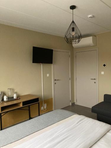 Côté Grangeにあるテレビまたはエンターテインメントセンター