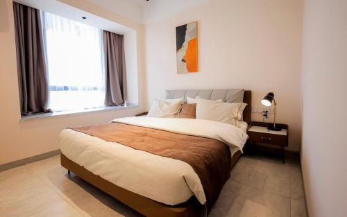 Postel nebo postele na pokoji v ubytování 3-Bedroom Appartment