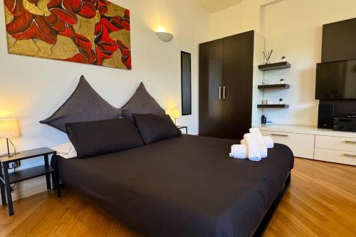 Ένα ή περισσότερα κρεβάτια σε δωμάτιο στο Guestsuite Maison 80123