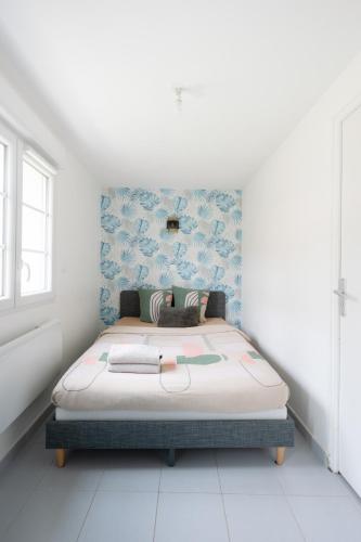 Photo de la galerie de l'établissement bleu lagon studio Moderne À 10 min de CDG et du parc expositions, à Tremblay-en-France