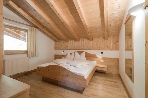 Pension-Appartement Mitterhoferにあるベッド