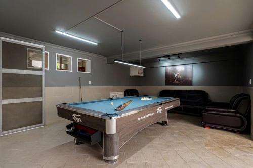 a billiard room with a pool table in it at Villa La Rose Blanc Thảo Điền in Ho Chi Minh City