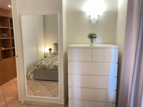 Cama o camas de una habitación en Urban Oasis in Rome