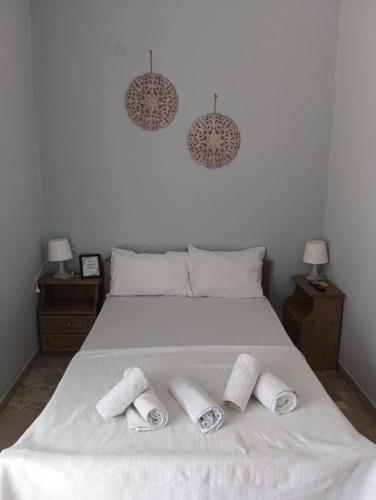 Ένα ή περισσότερα κρεβάτια σε δωμάτιο στο Vassia's B rooms