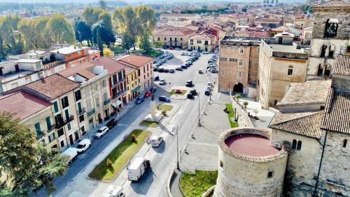 an aerial view of a city with cars on a street at Palazzo Polini Apartments in Sora