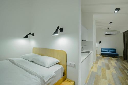 Ένα ή περισσότερα κρεβάτια σε δωμάτιο στο Mariinsky Boutique Hotel