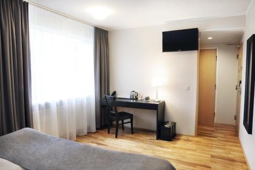Fosshotel Rauðaráにあるテレビまたはエンターテインメントセンター