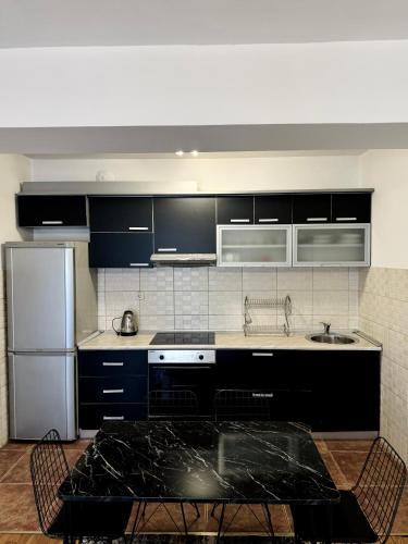 Cuina o zona de cuina de Downtown Apartment