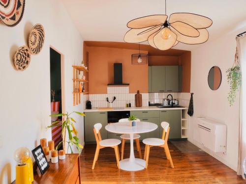 Kuchyň nebo kuchyňský kout v ubytování Appartement Clim Wifi Tendance