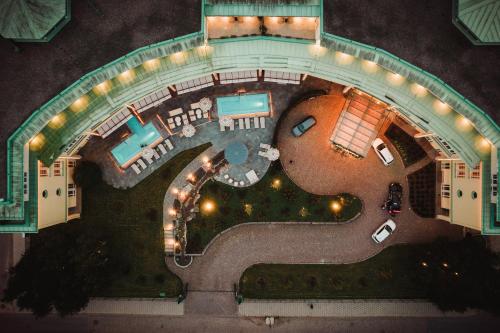 an overhead view of a resort at night with lights at Vana Spa Snäckviken by Elite - A proud member of The Leading Spa Hotels of Sweden in Södertälje
