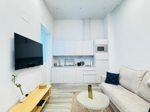 Η κουζίνα ή μικρή κουζίνα στο QE Apartments