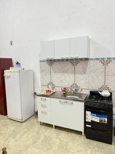 Η κουζίνα ή μικρή κουζίνα στο Departamento por día