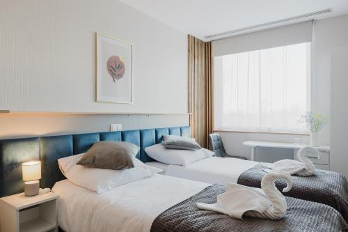 Silver Rooms by Kramm - Pokoje w hotelowym wydaniu