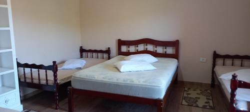 Postel nebo postele na pokoji v ubytování Chácara meu aconchego