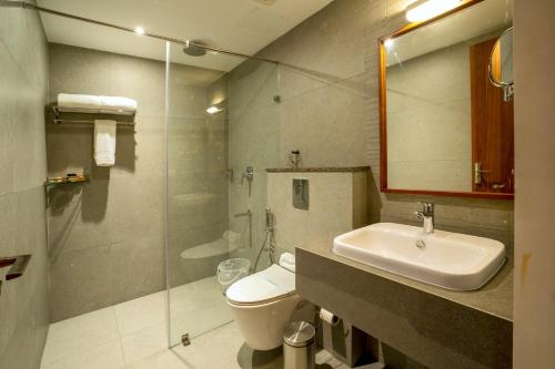 Un baño de Hotel Grand Aria