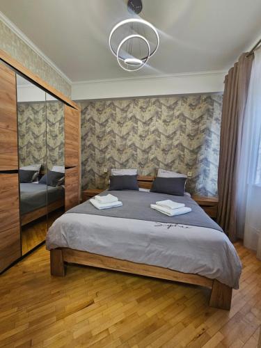 Katil atau katil-katil dalam bilik di Sayat-Nova Creative Apartment