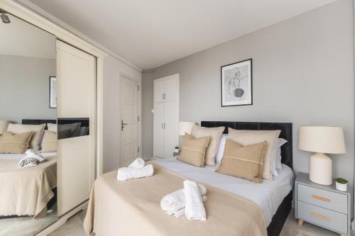 Ένα ή περισσότερα κρεβάτια σε δωμάτιο στο Appartement Spacieux à El Mouradia