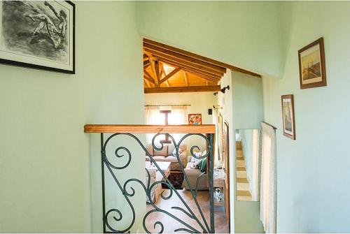 a room with a staircase and a living room at Aether & Gaia Seaview Villas, Agios Nikolaos #FeelsLikeHome in Akti Salonikiou