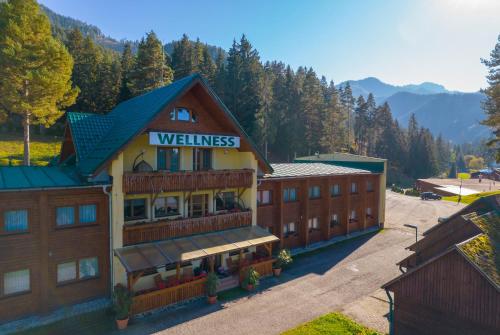 an overhead view of a hotel with mountains in the background at Hotel Bystrina in Demanovska Dolina