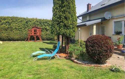 Κήπος έξω από το 1 Bedroom Cozy Apartment In Sarbinowo