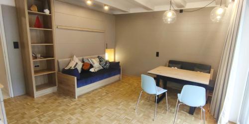 Postel nebo postele na pokoji v ubytování Alpenappartements Domicil include Jokercard