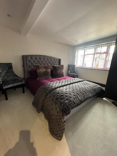 Postel nebo postele na pokoji v ubytování Cottage Retreat