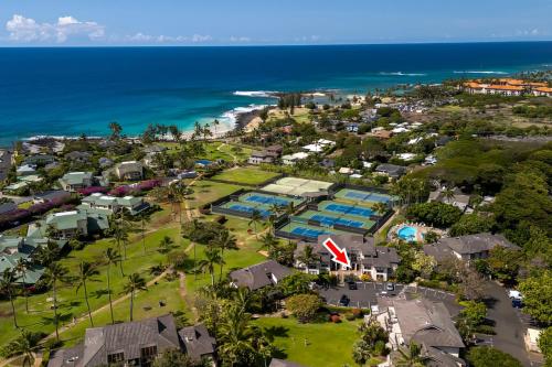 an aerial view of a resort and the ocean at Hale Lolo at Poipu Kai in Koloa