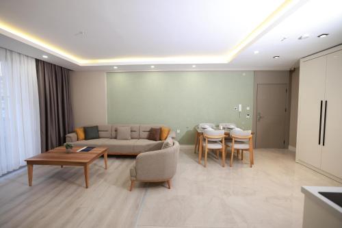 Χώρος καθιστικού στο Anemon Diyarbakır Suit Hotel