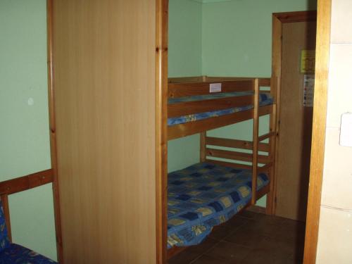 Palanda nebo palandy na pokoji v ubytování LCB Apartaments Pas de la Casa