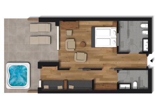 a floor plan of a small apartment with a room at Tratterhof Mountain Sky Hotel in Maranza