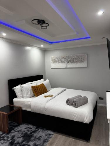 Ένα ή περισσότερα κρεβάτια σε δωμάτιο στο Paramount Luxe Loft- 3 bedrooms, 4 beds cosy home