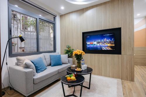 TV a/nebo společenská místnost v ubytování Crescendo Unique Studio