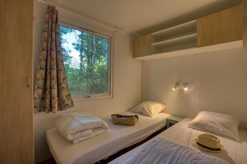 Photo de la galerie de l'établissement Camping Le Pech Charmant, à Les Eyzies-de-Tayac