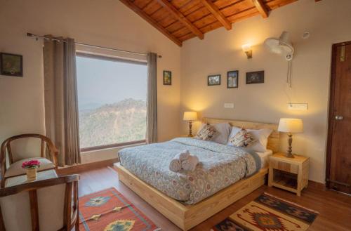 Una cama o camas en una habitación de Sahasrara Anahata