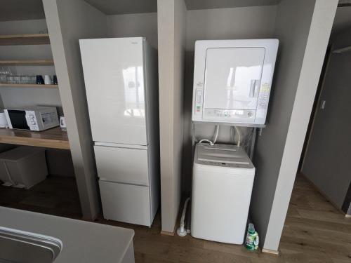Dapur atau dapur kecil di Aki's Apartments Madarao