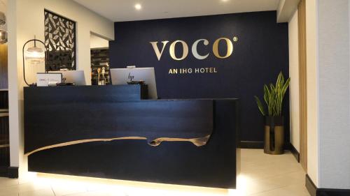 a store with a vico sign on the wall at voco Flagstaff by IHG in Flagstaff