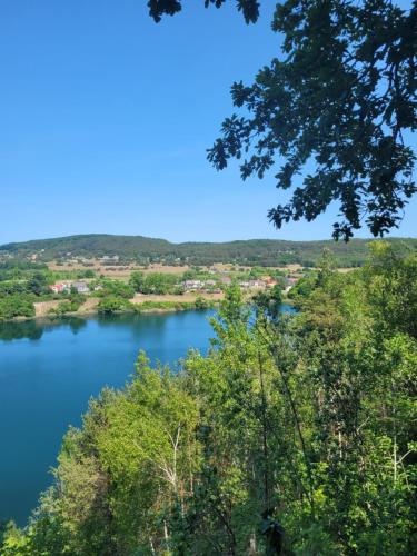 a view of a lake from a tree at Chatki przy Marinie in Wapnica