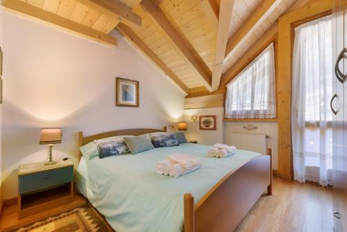 Postel nebo postele na pokoji v ubytování Fresia Chalet