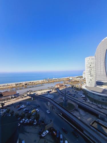 an aerial view of a city with a parking lot at Beach View Bliss Apartment in Angisa