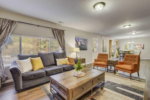 a living room with a couch and a table at Mountain Villa Scenic Views Hot Tub & Fire Pit in Cascade-Chipita Park