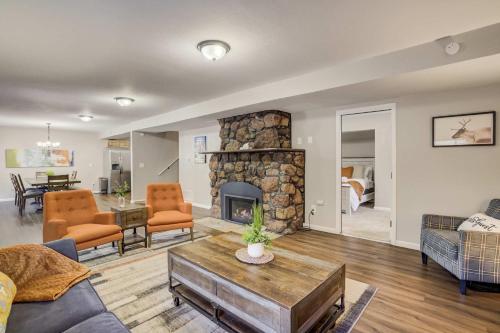 a living room with a couch and a fireplace at Mountain Villa Scenic Views Hot Tub & Fire Pit in Cascade-Chipita Park