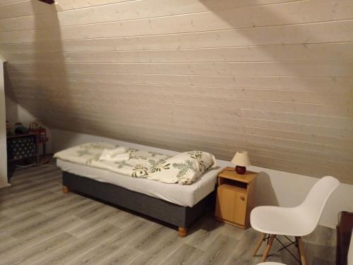 Ένα ή περισσότερα κρεβάτια σε δωμάτιο στο Apartmán Eva